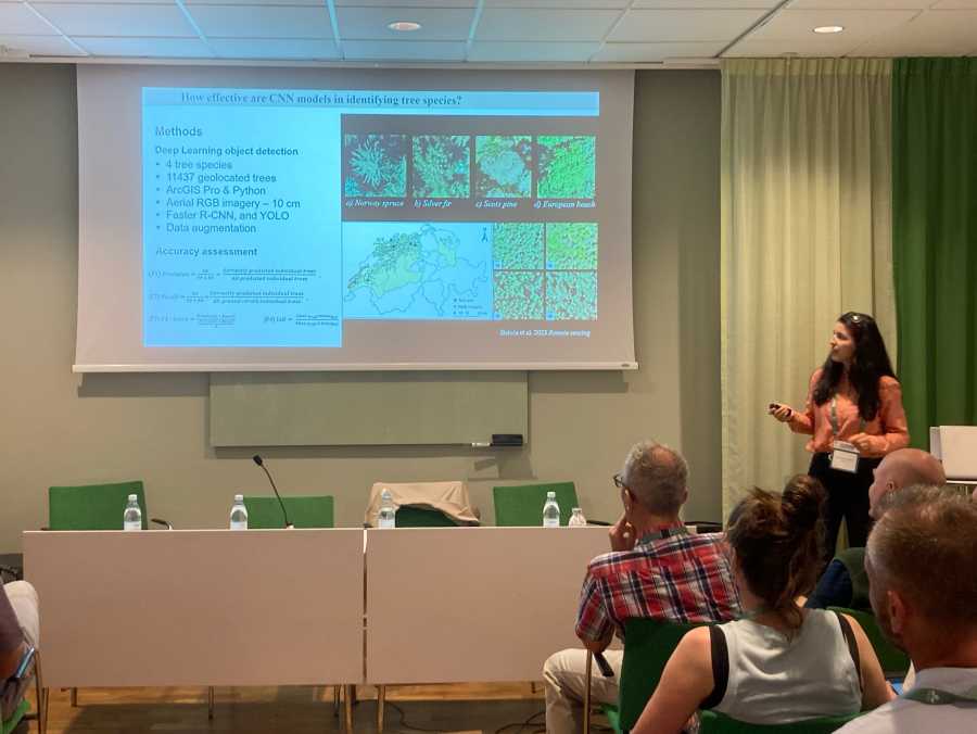 Dr. Mirela Beloiu Schwenke giving a presentation